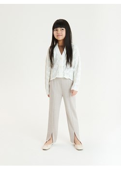 Reserved - Spodnie z rozcięciami - beżowy ze sklepu Reserved w kategorii Spodnie dziewczęce - zdjęcie 173768330
