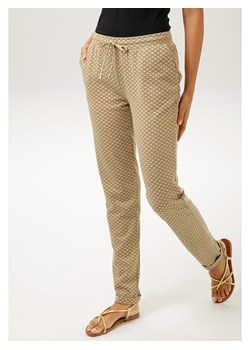 Aniston Spodnie w kolorze beżowym ze sklepu Limango Polska w kategorii Spodnie damskie - zdjęcie 173773810