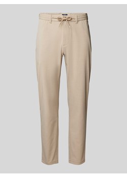 Spodnie materiałowe o kroju tapered fit z tunelem ze sklepu Peek&Cloppenburg  w kategorii Spodnie męskie - zdjęcie 173795953