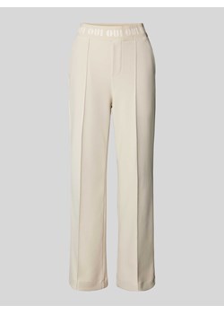 Spodnie materiałowe z detalem z logo ze sklepu Peek&Cloppenburg  w kategorii Spodnie damskie - zdjęcie 173803053