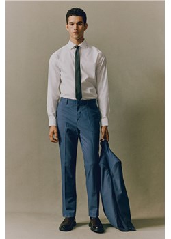 H & M - Spodnie garniturowe Slim Fit - Niebieski ze sklepu H&M w kategorii Spodnie męskie - zdjęcie 173817050