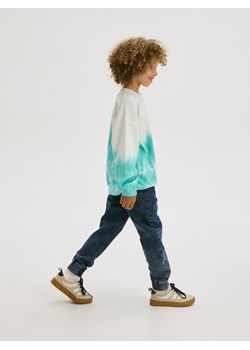 Reserved - Elastyczne jeansy jogger - granatowy ze sklepu Reserved w kategorii Spodnie chłopięce - zdjęcie 173822601