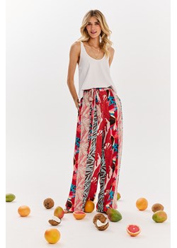 Szerokie spodnie Floral Frenzy XS/S ze sklepu NAOKO w kategorii Spodnie damskie - zdjęcie 173831321