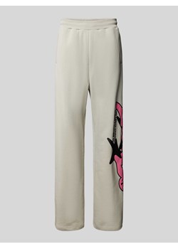 Spodnie dresowe z nadrukiem z motywem model ‘ASTRO’ ze sklepu Peek&Cloppenburg  w kategorii Spodnie męskie - zdjęcie 173833250