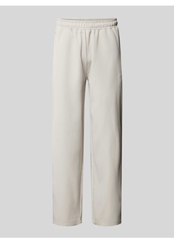 Spodnie dresowe z wyhaftowanym logo model ‘TROY’ ze sklepu Peek&Cloppenburg  w kategorii Spodnie męskie - zdjęcie 173833781