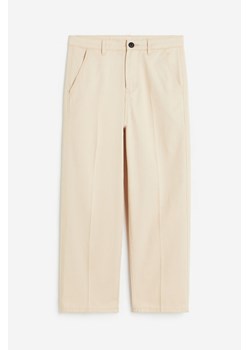 H & M - Spodnie chinos Relaxed Fit - Beżowy ze sklepu H&M w kategorii Spodnie chłopięce - zdjęcie 173840544