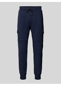 Spodnie dresowe z detalem z logo ze sklepu Peek&Cloppenburg  w kategorii Spodnie męskie - zdjęcie 173862960