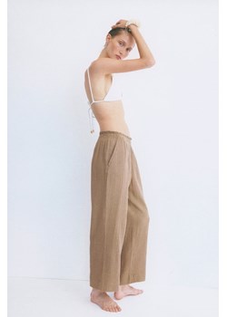 H & M - Spodnie z talią paper bag - Beżowy ze sklepu H&M w kategorii Spodnie damskie - zdjęcie 173864491