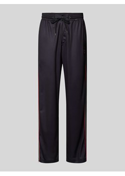 Spodnie dresowe z detalem z logo ze sklepu Peek&Cloppenburg  w kategorii Spodnie męskie - zdjęcie 173872452