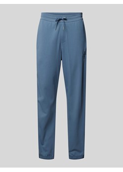 Spodnie dresowe z elastycznym ściągaczem ze sklepu Peek&Cloppenburg  w kategorii Spodnie męskie - zdjęcie 173895220