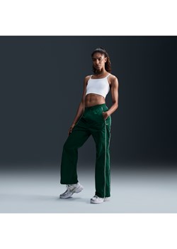 Damskie spodnie z tkaniny z wysokim stanem i luźnymi nogawkami Nike Windrunner - Zieleń ze sklepu Nike poland w kategorii Spodnie damskie - zdjęcie 173984840