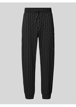 Spodnie dresowe o kroju regular fit z zaznaczonym rozporkiem ze sklepu Peek&Cloppenburg  w kategorii Spodnie męskie - zdjęcie 173989494