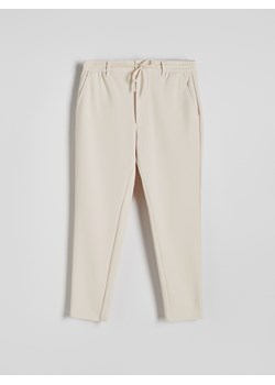 Reserved - Spodnie chino slim fit - złamana biel ze sklepu Reserved w kategorii Spodnie męskie - zdjęcie 173994740