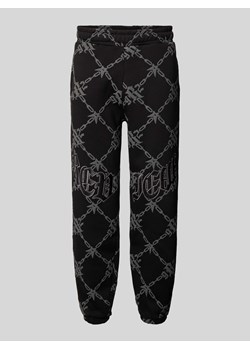Spodnie dresowe o kroju regular fit z naszywkami z logo ze sklepu Peek&Cloppenburg  w kategorii Spodnie męskie - zdjęcie 174088024