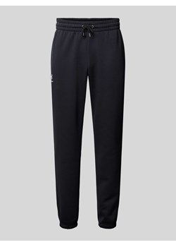 Spodnie dresowe o kroju regular fit z wyhaftowanym logo ze sklepu Peek&Cloppenburg  w kategorii Spodnie męskie - zdjęcie 174088330