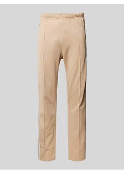 Spodnie treningowe o kroju regular fit z kieszeniami zapinanymi na zamek błyskawiczny ze sklepu Peek&Cloppenburg  w kategorii Spodnie męskie - zdjęcie 174092733