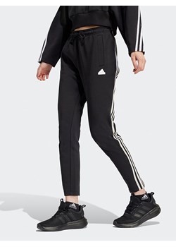 adidas Spodnie dresowe w kolorze czarnym ze sklepu Limango Polska w kategorii Spodnie damskie - zdjęcie 174100354
