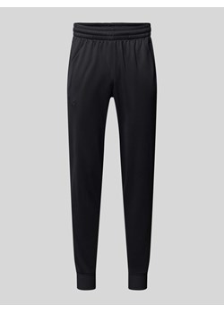 Spodnie dresowe o kroju loose fit z bocznymi,wpuszczanymi kieszeniami ze sklepu Peek&Cloppenburg  w kategorii Spodnie męskie - zdjęcie 174117014