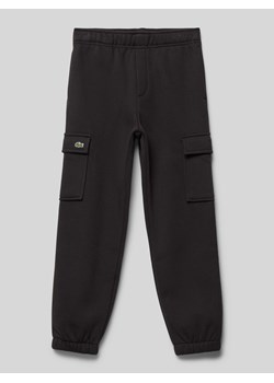 Spodnie dresowe z kieszeniami cargo ze sklepu Peek&Cloppenburg  w kategorii Spodnie chłopięce - zdjęcie 174127570