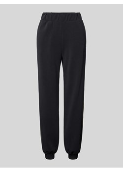 Spodnie dresowe z elastycznym ściągaczem ze sklepu Peek&Cloppenburg  w kategorii Spodnie męskie - zdjęcie 174131824
