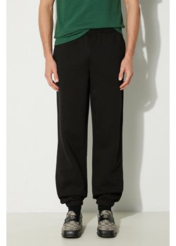 Lacoste spodnie dresowe kolor czarny melanżowe ze sklepu PRM w kategorii Spodnie męskie - zdjęcie 174175720
