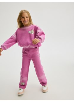 Reserved - Spodnie dresowe Pusheen - fioletowy ze sklepu Reserved w kategorii Spodnie dziewczęce - zdjęcie 174329313