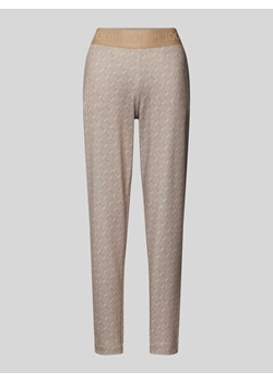 Spodnie dresowe o kroju slim fit z paskiem z logo ze sklepu Peek&Cloppenburg  w kategorii Spodnie damskie - zdjęcie 174371050