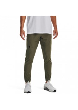 Męskie spodnie treningowe UNDER ARMOUR  UNSTOPPABLE TAPERED PANTS - oliwkowe/khaki ze sklepu Sportstylestory.com w kategorii Spodnie męskie - zdjęcie 174387114