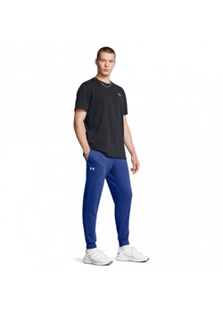 Męskie spodnie dresowe Under Armour UA Rival Fleece Joggers - niebieskie ze sklepu Sportstylestory.com w kategorii Spodnie męskie - zdjęcie 174388571