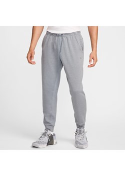 Męskie uniwersalne joggery Dri-FIT UV Nike Primary - Szary ze sklepu Nike poland w kategorii Spodnie męskie - zdjęcie 174505773