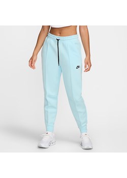 Damskie joggery ze średnim stanem Nike Sportswear Tech Fleece - Niebieski ze sklepu Nike poland w kategorii Spodnie damskie - zdjęcie 174505942
