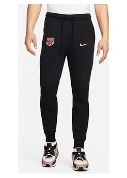 Męskie joggery piłkarskie Nike FC Barcelona Tech Fleece - Czerń ze sklepu Nike poland w kategorii Spodnie męskie - zdjęcie 174506124