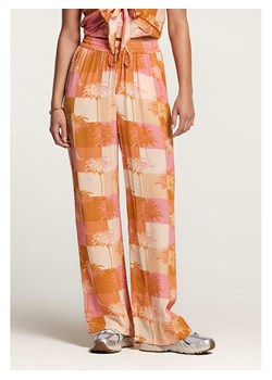 SHIWI Spodnie w kolorze różowo-pomarańczowym ze sklepu Limango Polska w kategorii Spodnie damskie - zdjęcie 174555302