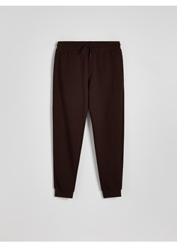 Reserved - Spodnie dresowe ze ściągaczem - brązowy ze sklepu Reserved w kategorii Spodnie męskie - zdjęcie 174559151