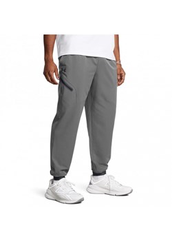 Męskie spodnie treningowe Under Armour UA Unstoppable Joggers - szare ze sklepu Sportstylestory.com w kategorii Spodnie męskie - zdjęcie 174562222