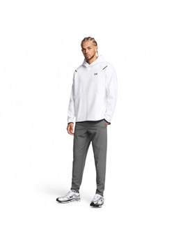 Męskie spodnie treningowe Under Armour UA Unstoppable Tapered Pants - szare ze sklepu Sportstylestory.com w kategorii Spodnie męskie - zdjęcie 174562352