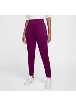 Damskie spodnie z dzianiny do tenisa NikeCourt Dri-FIT - Czerwony ze sklepu Nike poland w kategorii Spodnie damskie - zdjęcie 174573263