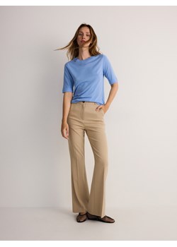 Reserved - Spodnie flare - beżowy ze sklepu Reserved w kategorii Spodnie damskie - zdjęcie 174624560