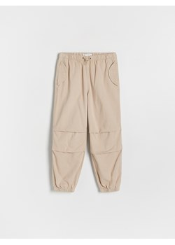 Reserved - Classic denim parachute - beżowy ze sklepu Reserved w kategorii Spodnie dziewczęce - zdjęcie 174765931