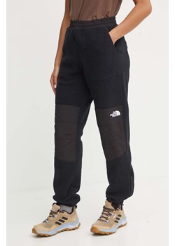 The North Face spodnie dresowe Retro Denali Pant kolor czarny gładkie NF0A88YSJK31 ze sklepu PRM w kategorii Spodnie damskie - zdjęcie 174870722