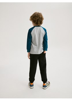 Reserved - Dresowe spodnie jogger - czarny ze sklepu Reserved w kategorii Spodnie chłopięce - zdjęcie 174958283