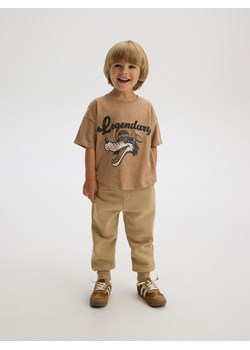 Reserved - Dresowe spodnie - beżowy ze sklepu Reserved w kategorii Spodnie chłopięce - zdjęcie 175193370