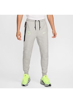 Męskie joggery piłkarskie Nike FC Barcelona Tech Fleece - Szary ze sklepu Nike poland w kategorii Spodnie męskie - zdjęcie 175459373