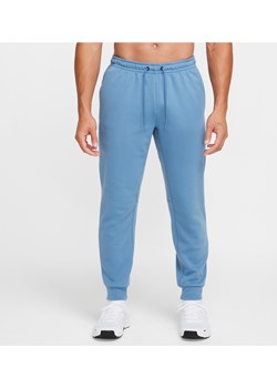 Męskie uniwersalne joggery Dri-FIT UV Nike Primary - Niebieski ze sklepu Nike poland w kategorii Spodnie męskie - zdjęcie 175589823