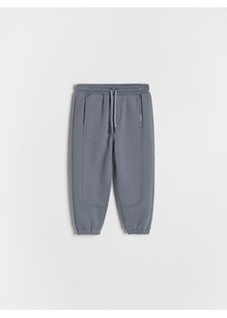 Reserved - Dresowe spodnie jogger - granatowy ze sklepu Reserved w kategorii Spodnie chłopięce - zdjęcie 175593051