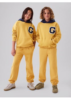 GAP Spodnie dresowe w kolorze żółtym ze sklepu Limango Polska w kategorii Spodnie dziewczęce - zdjęcie 175664472