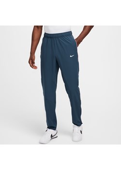 Męskie spodnie do tenisa Dri-FIT NikeCourt Advantage - Niebieski ze sklepu Nike poland w kategorii Spodnie męskie - zdjęcie 175703994