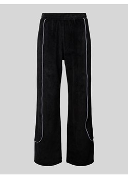 Spodnie typu track pants o kroju regular fit z wyhaftowanym logo ze sklepu Peek&Cloppenburg  w kategorii Spodnie męskie - zdjęcie 175850203