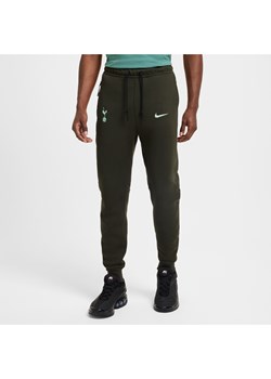 Męskie joggery piłkarskie Nike Tottenham Hotspur Tech Fleece (wersja trzecia) - Zieleń ze sklepu Nike poland w kategorii Spodnie męskie - zdjęcie 175925553