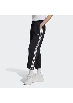 Spodnie dresowe damskie adidas Essentials 3-Stripes Open Hem Fleece ze sklepu Decathlon w kategorii Spodnie damskie - zdjęcie 176142690